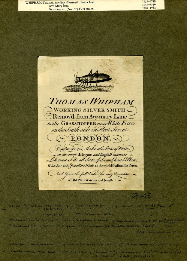 Altes Buch mit einer Zeichnung einer Heuschrecke auf dem Cover, das handgeschriebene Text auf den Seiten enthält.