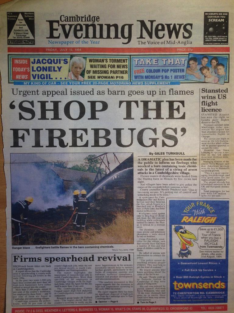 Newspaper front page with multiple advertisements and headlines.