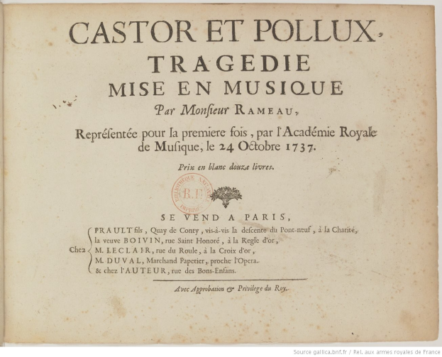 Old book titled "Castor et Pollux Tragedie Mise en Musique" open to a page with cursive text in a decorative border.