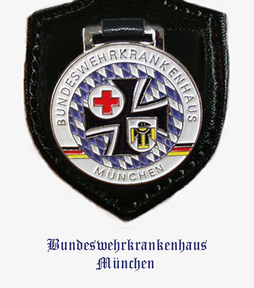 Black leather patch with a red cross logo and text "Bundeswehrkrankenhaus München" at the bottom.