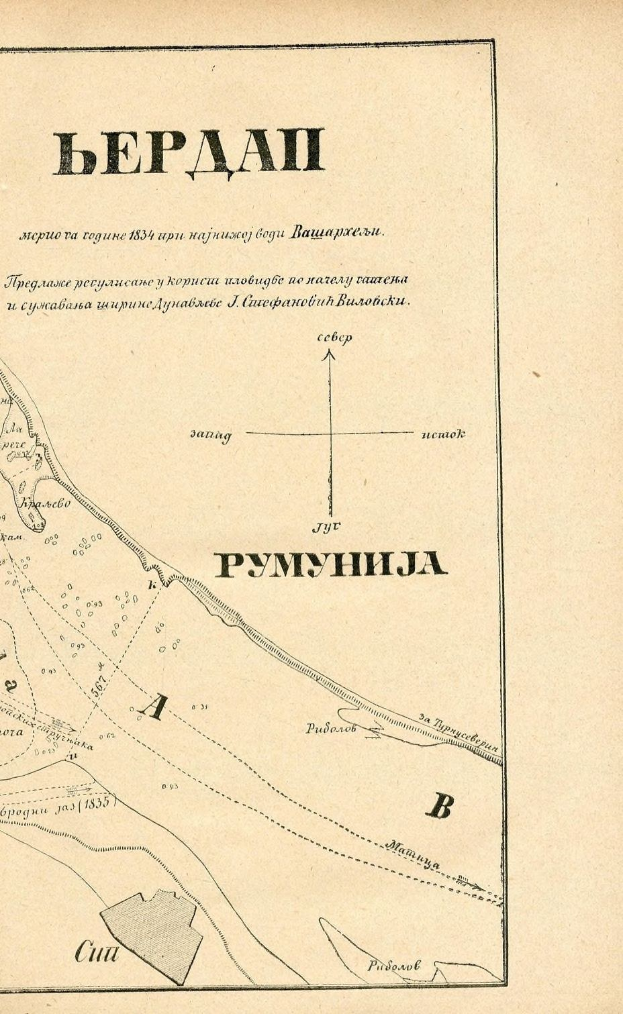 An old book featuring a detailed map of Kiev, Ukraine, with visible streets, buildings, and landmarks, alongside text providing information about the city.