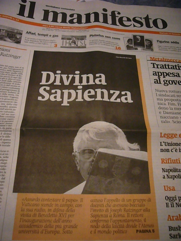 A newspaper with visible text in the center of the image.