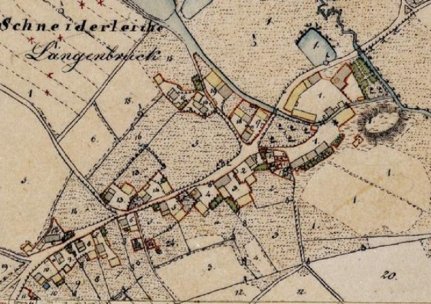 Old detailed map of Langerbruch, Germany, with Schneiderläderkirche at the center, showing streets, buildings, and surrounding area with textual information.