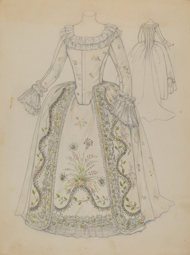 A white embroidered dress with blue, green, and yellow details, lace, and beading displayed on a mannequin, featuring a fitted bodice, voluminous skirt, high neckline, and long sleeves.
