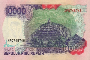 Indonesische 1000-Rupiah-Banknote mit einem Gebäude und Bäumen