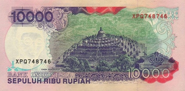 Indonesische 1000-Rupiah-Banknote mit einem Gebäude und Bäumen