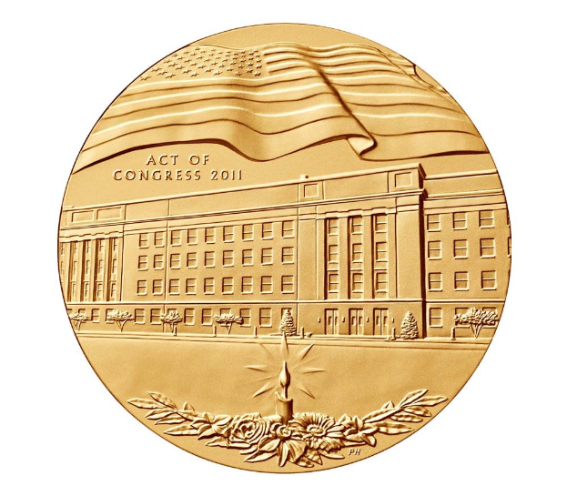 Gold coin with "Act of Congress 2011" inscription, featuring an image of a building and a flag.