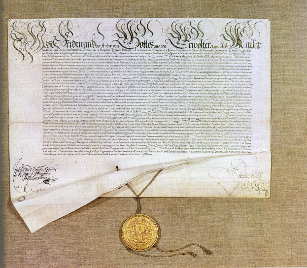 Dokument mit goldenem Siegel, Text und einem Faden, der darum gebunden ist und an einen Vertrag erinnert.