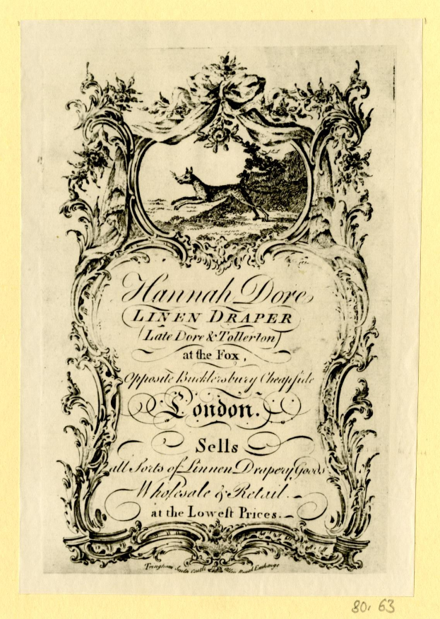 Ein altes Buch mit einer realistischen Illustration eines Hundes auf dem Cover und fetter Schrift auf altem Papier.
