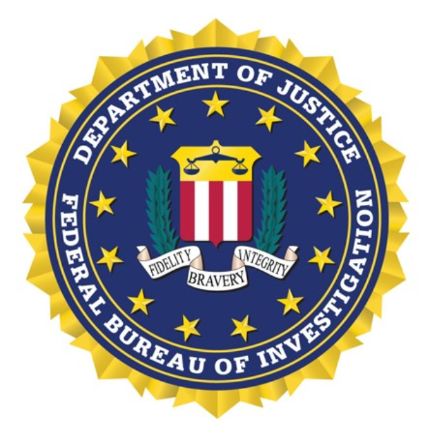 Blauer Kreis mit einem weißen Stern, umgeben von einem weißen Banner mit 'Federal Bureau of Investigations' in weißer Schrift auf einem Marinehintergrund.