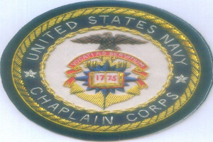 Ein rundes Patch mit einem blauen Hintergrund und einem weißen Rand, das den Text 'United States Navy Chaplain Corps' in Weiß zeigt, mittig platziert.