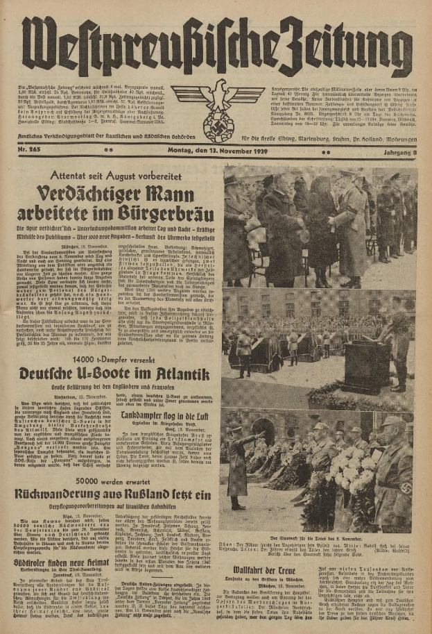 Schwarze und weiße Titelseite einer deutschen Zeitung vom 13. November 1939 mit der Überschrift 'Weitpreubliche Zeitung', die eine Gruppe von Menschen in traditioneller deutscher Kleidung in einer feierlichen Szenerie zeigt.