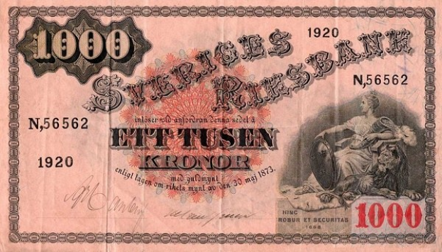 Alte schwedische 1000-Kronen-Banknote von 1920 mit einem Portr├Ąt einer Frau, mit gedrucktem Text, Zahlen und einer Unterschrift.