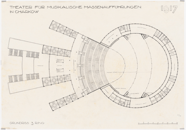 Black and white architectural drawing of a circular theater with numerous windows, labeled for musical mass performances in Kharkiv, on a paper with handwritten text.
