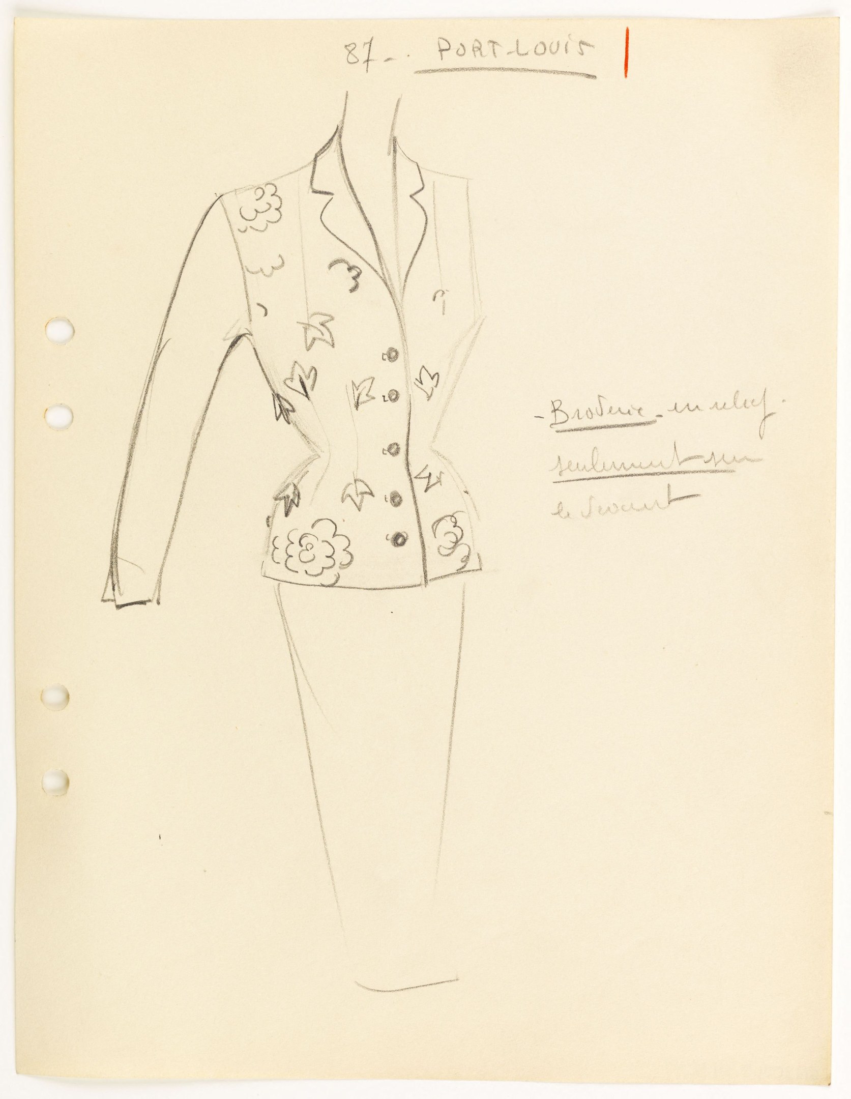 Skizze einer Schaufensterpuppe in einem hellen Blazer mit kleinem Blumenmuster und engem dunklen Hosen, mit deutlichem Text auf dem Papier darunter.